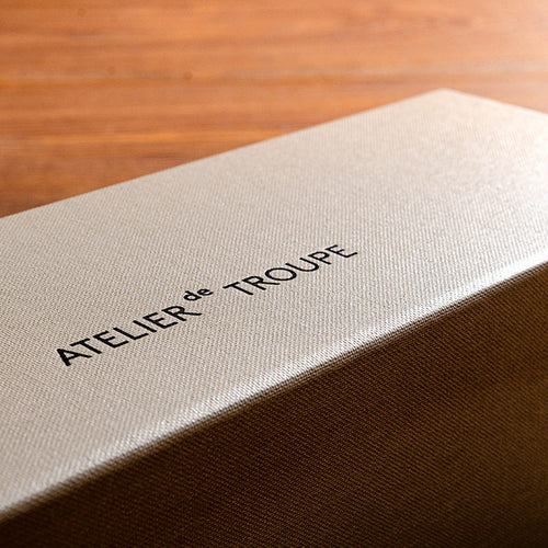 black foil embossed logo on presentation box