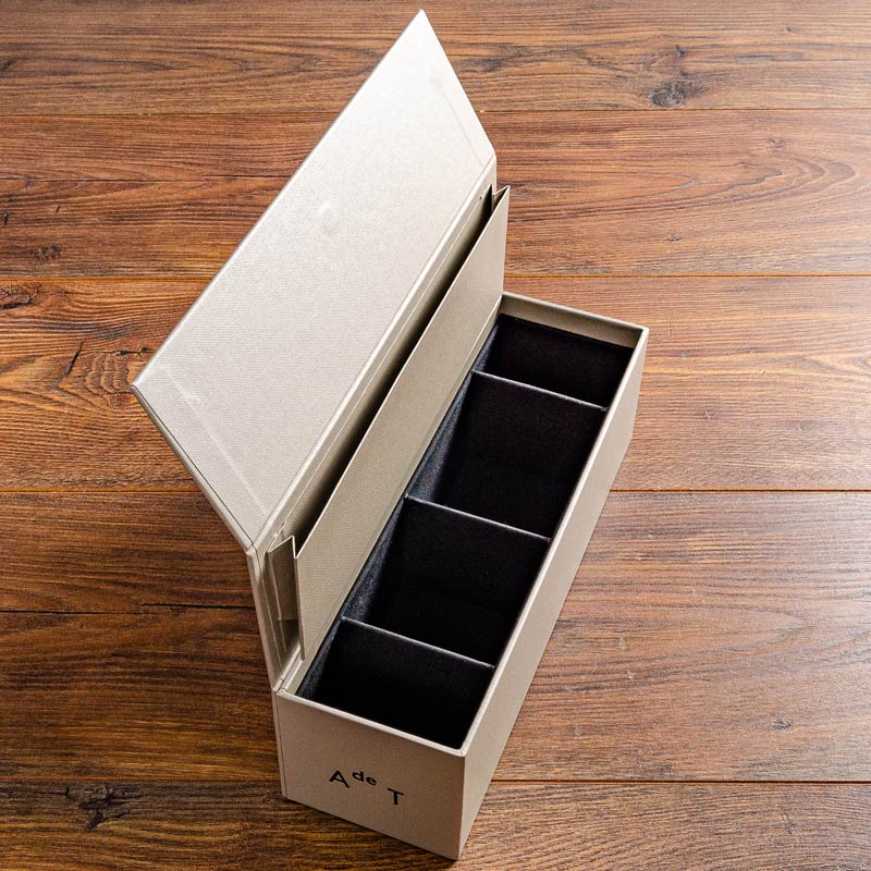 small custom made presentation box open in beige cloth with personalised cover by Hartnack and Co - Gallery image 1