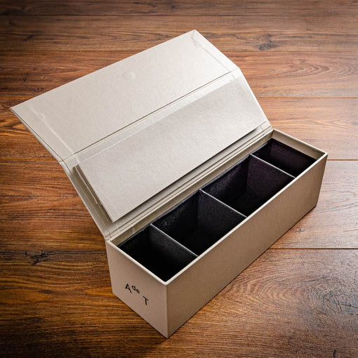 Custom made presentation box with lid open in beige cloth with personalised cover by Hartnack and Co