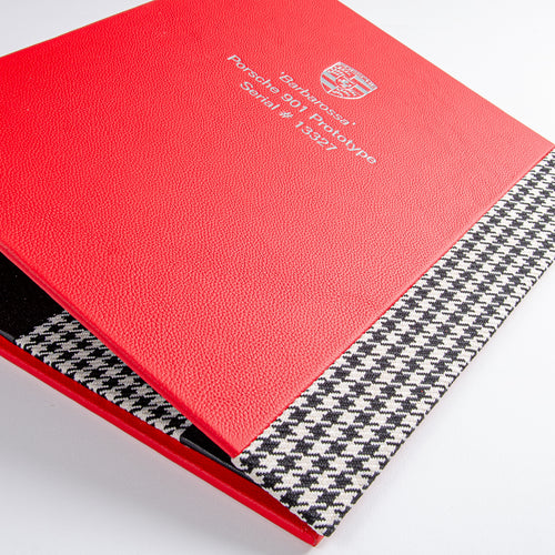Luxury red leather ring binder with custom fabric detailing and silver foil embossed personalized cover