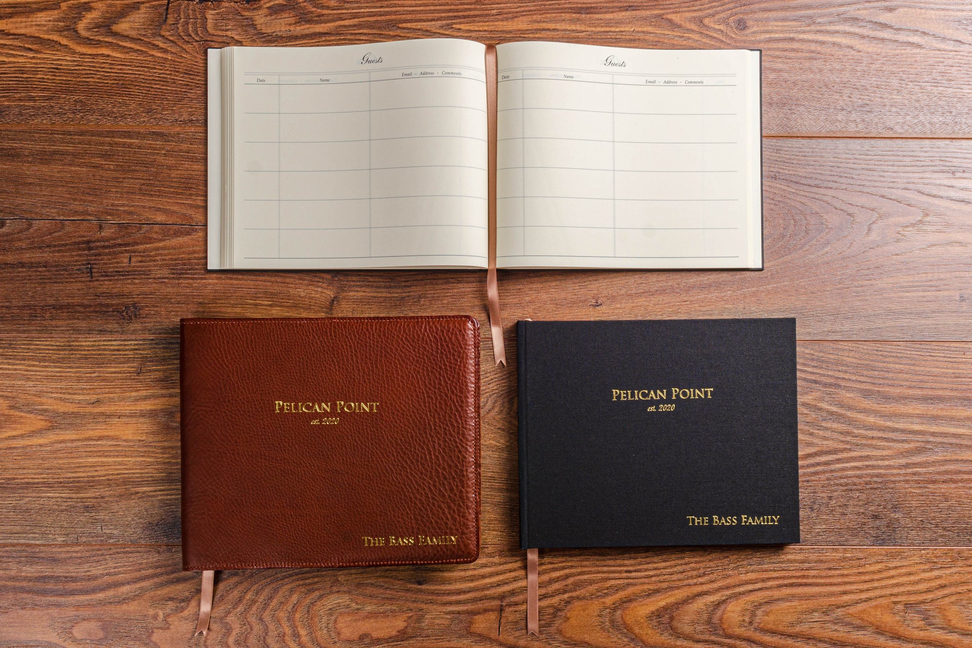 Personalised guest books and leather bound menu set