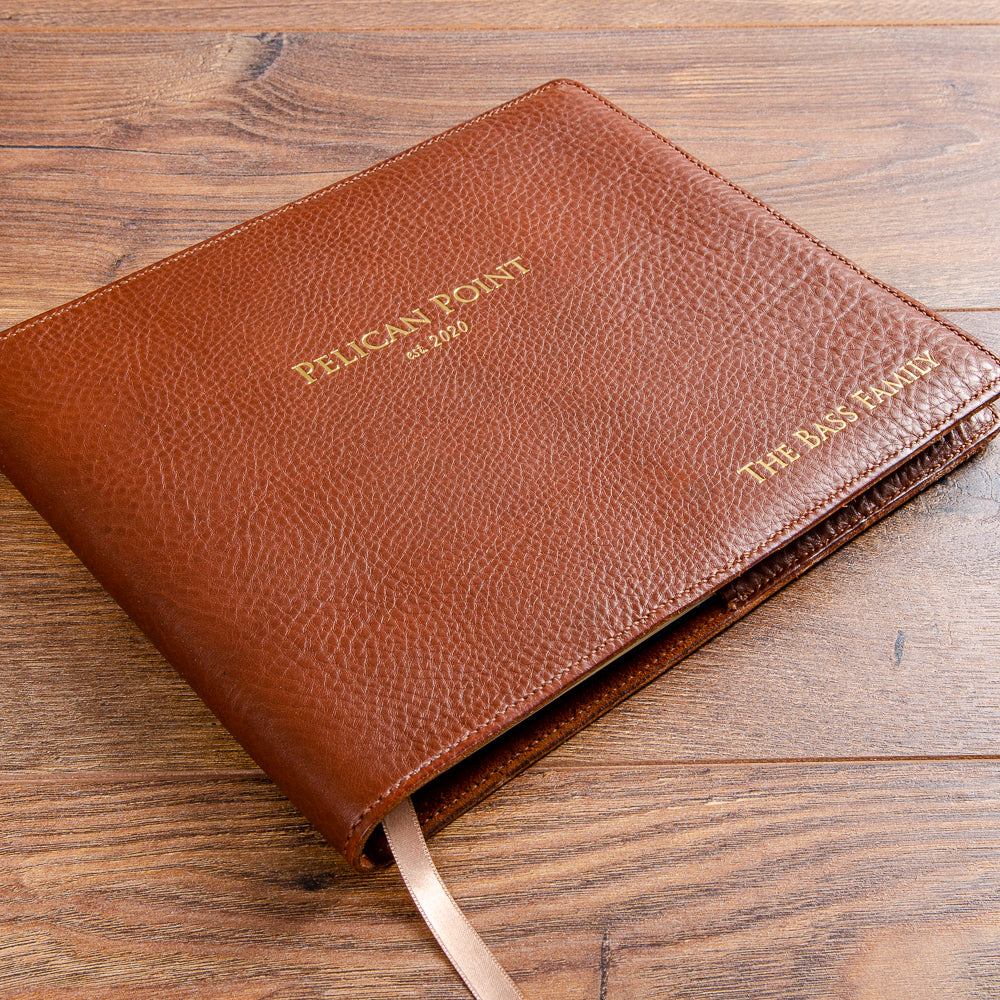 Personalised guest book with gold embossed cover and genuine leather personalised dust jacket - Gallery image 1