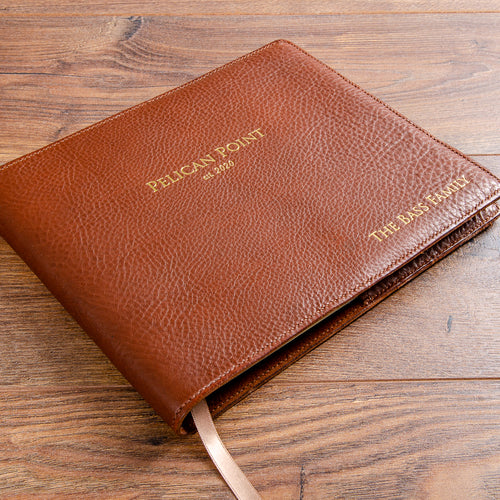 Personalised guest book with gold embossed cover and genuine leather personalised dust jacket