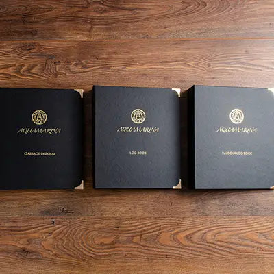 Three personalised ring binders for owner documents, service history and technical information for classic car file in green faux leather and foil embossed logos