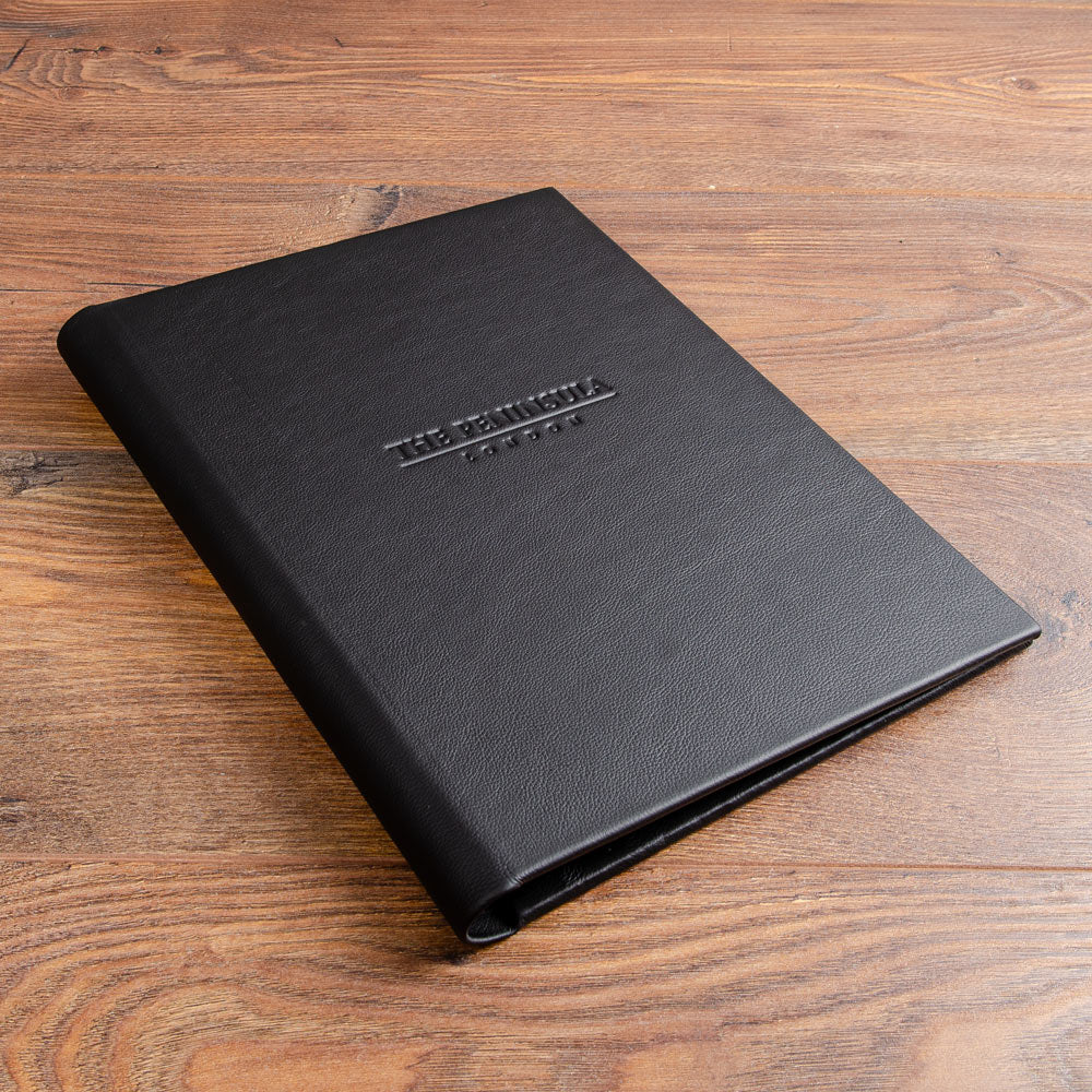 Black genuine leather menu cover with personalised blind embossed logo for luxury international hotel - Gallery image 3
