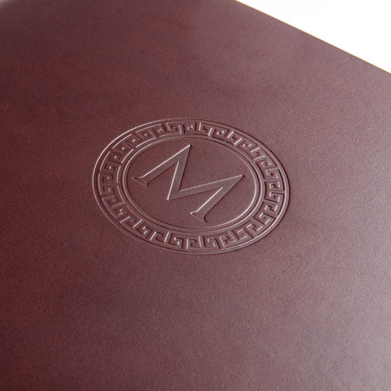 Blind emboss stamping on the personalised cover of a guest book