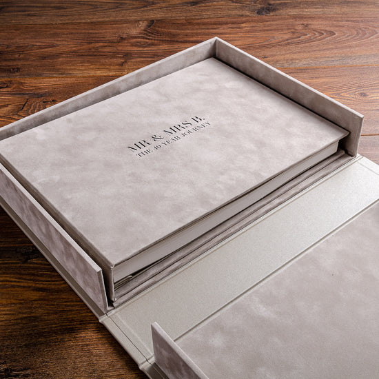 luxury velvet covered album with black foil embossed cover in a clamshell box by Hartnack and co