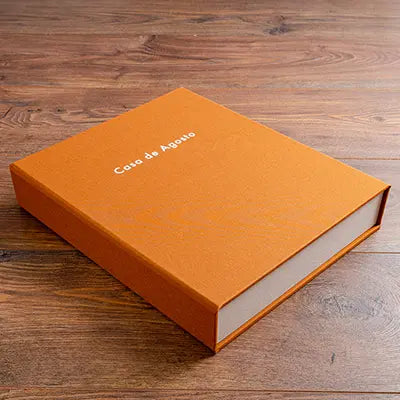 Luxury personalised A4 box file in orange book cloth with white foil personalisation on embossed on the cover