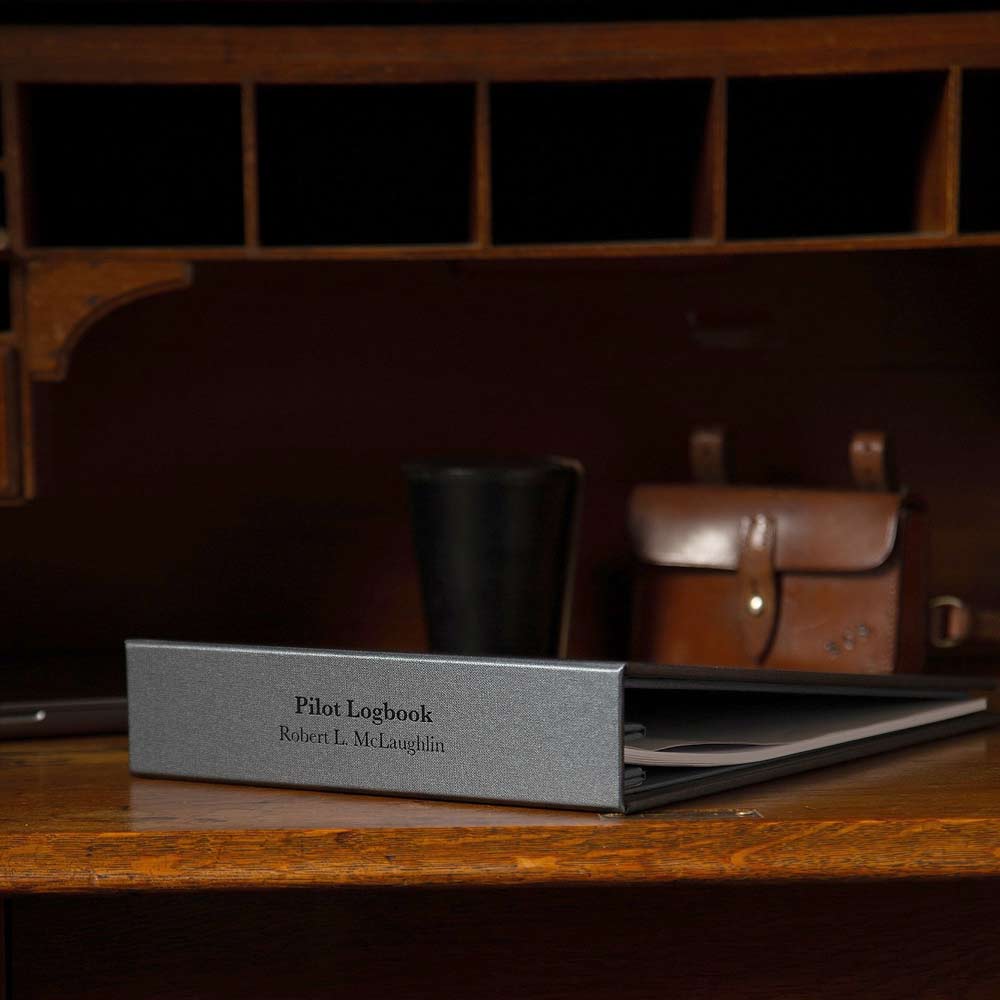 personalised pilot logbook binder in grey bookcloth on wooden desk - Gallery image 7