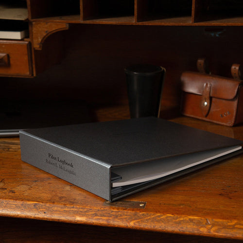 pilot logbook binder with personalized name on the cover and spine