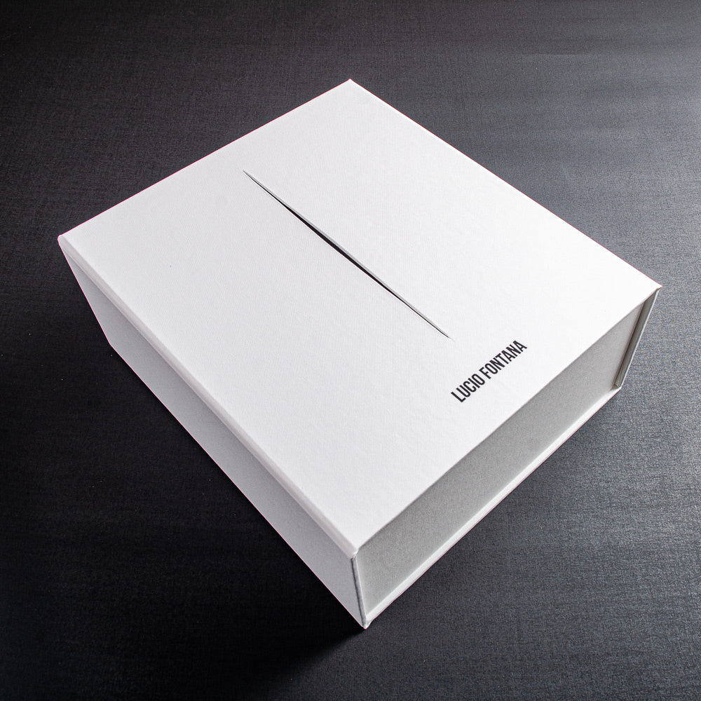 white clamshell box file with black cut out stripe and black foil embossed logo - Photographers & Designers, Drop Back Boxes