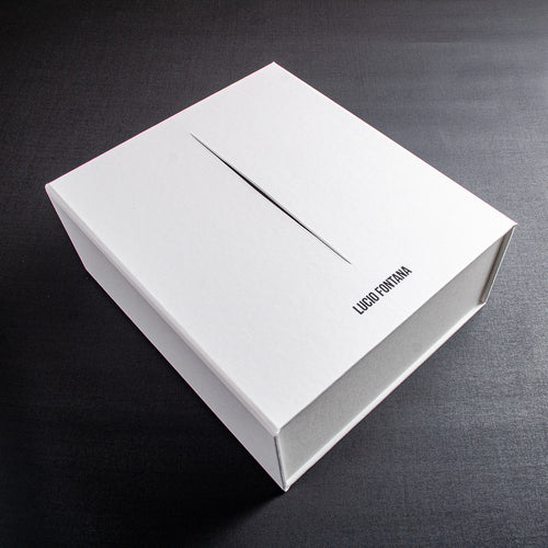 white clamshell box file with black cut out stripe and black foil embossed logo