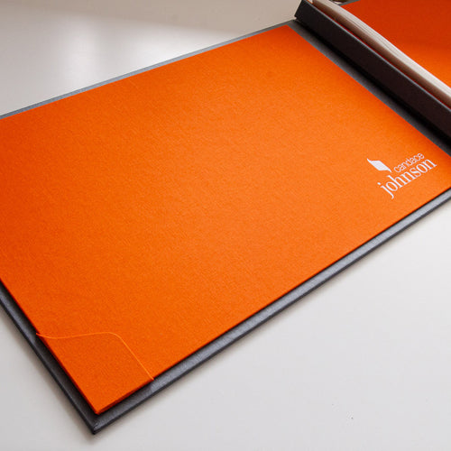 orange fabric inner cover with business card holder and white foil personalisaton