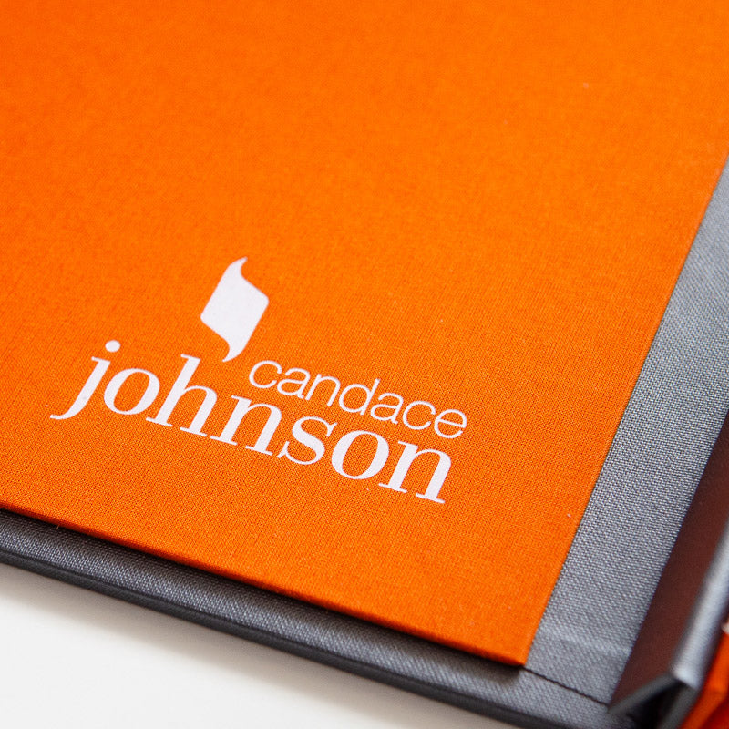 while foil embossing on orange inner cover of personalised presentation binder - Gallery image 5