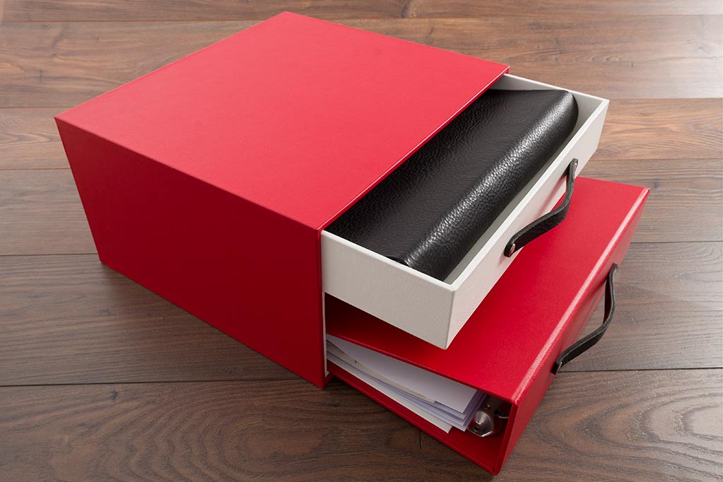 Double slipcase vehicle document box with black leather binders