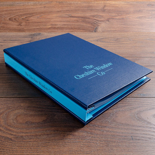 custom made A4 presentation binder in blue cloth and light embossed personalised cover