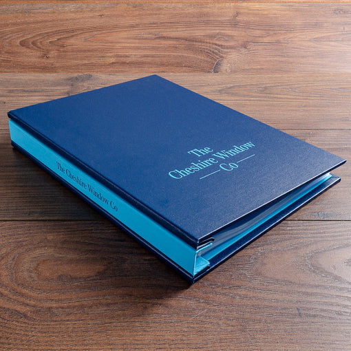 custom made A4 presentation binder in blue cloth and light embossed personalised cover
