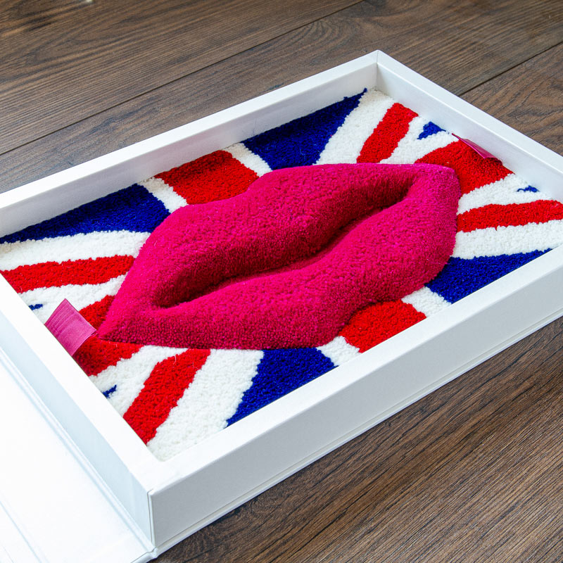 Presentation box for carpet company with union jack flag and large lips made out of carpet - Gallery image 1