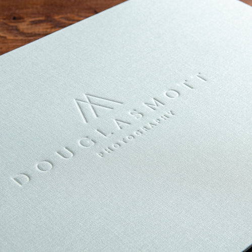 blind deboss logo on the cover of luxury binder