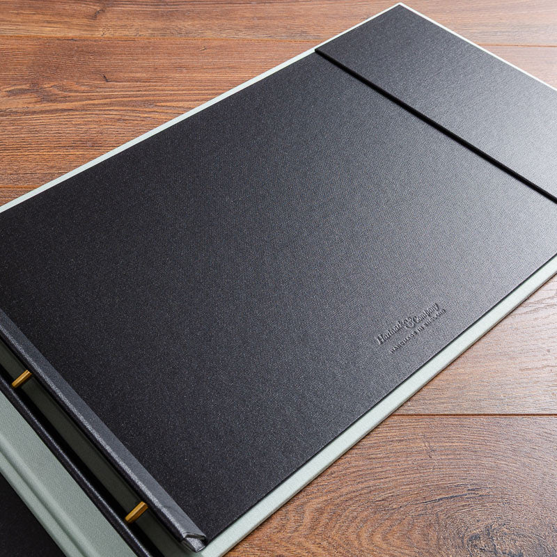 Hartnack and Company logo stamped into the cover of a landscape portfolio book - Gallery image 5