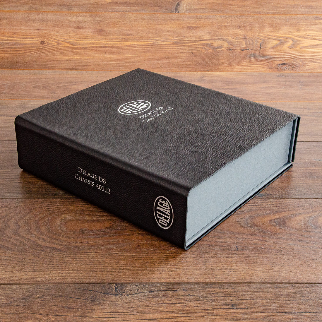 luxury leather box file for classic car history with silver foil embossed logo and car details - Gallery image 1