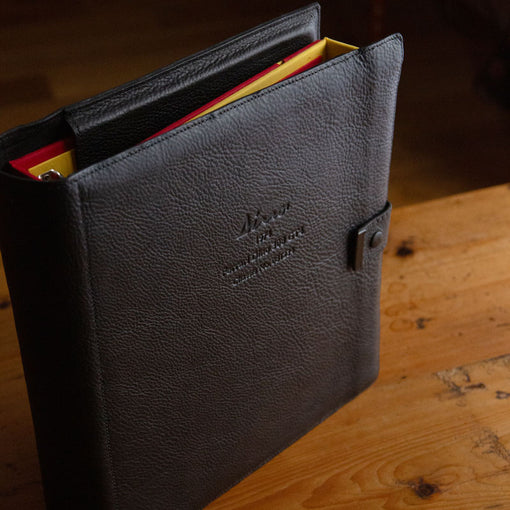 Custom made black leather luxury ring binder holder containing 2 ring binders with personalised cover by Hartnack & Co.
