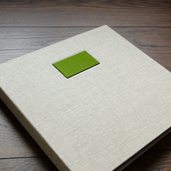 Green fabric name plaque in a custom made 12x12 album