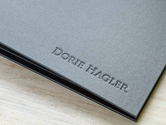 Blind deboss example on the personalised cover of a portfolio book
