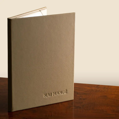 High end leather double page menu cover made by Hartnack & Co with a blind deboss personalisation