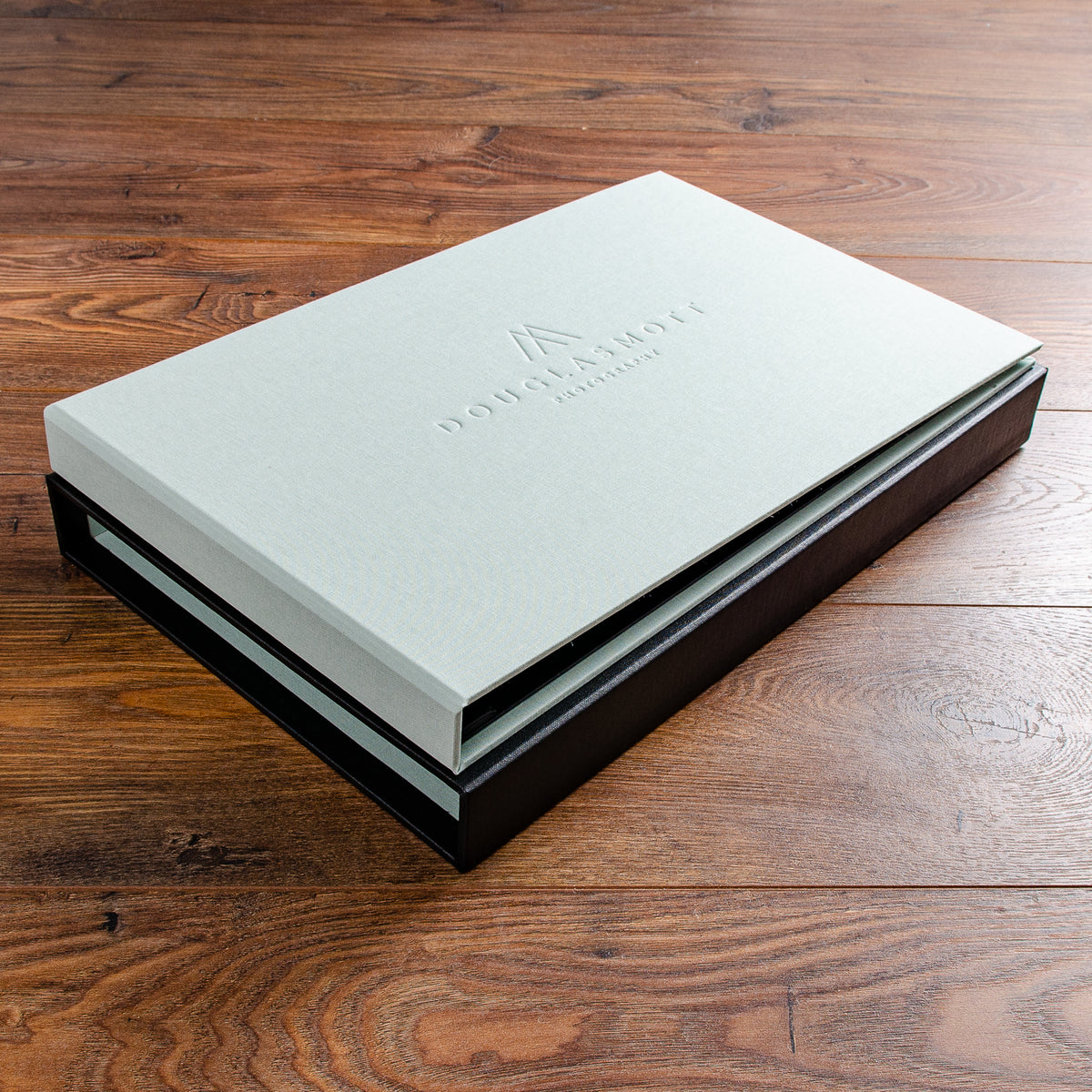 A3 landscape portfolio binder in light green fabric with personalised cover on black slipcase - Gallery image 6