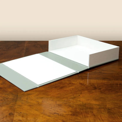 Drop Back Box luxury bespoke clamshell presentation box with magnetic closures, handcrafted by Hartnack and Company.