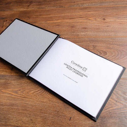 Coradine logten pilot logbook printed sheets inside a hartnack screw post binder