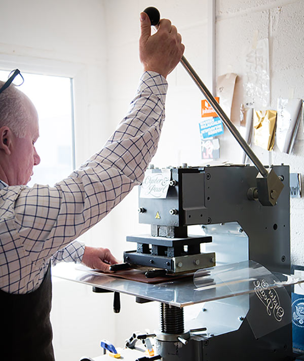personalising and embossing leather in hartnack and co studio