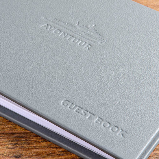 Blind embossed example of a personalised luxury leather guest book
