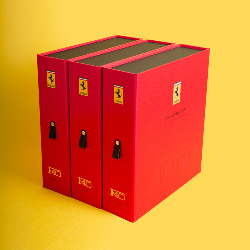 Three custom made red boxes for classic Ferrari with history, service and restoration and F40 logo embossed on the cover and spine - Gallery image 1