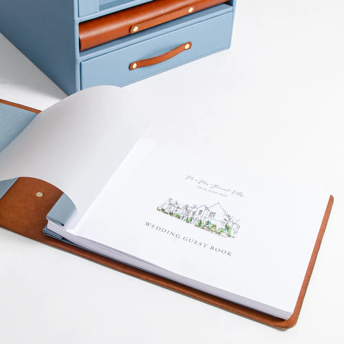 Custom made personalised leather wedding guest book with printed  pages and fly sheet.