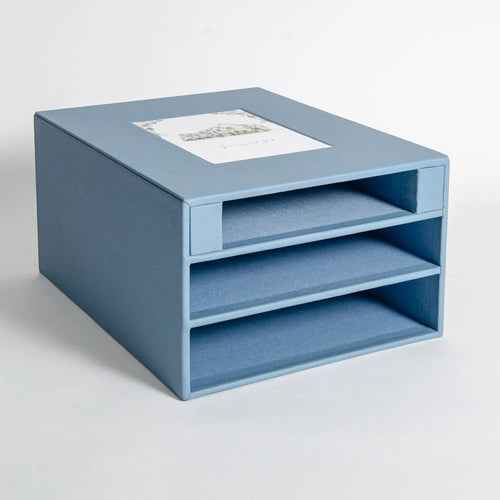 Premium luxury leather slipcase box with lined enclosures and recessed space with wedding invitation placed in the centre.