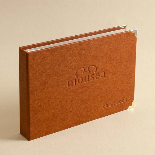 Vegan or PU Leather personalised guest book with blind embossed logo on the cover and guest book title on the bottom right hand corner and quality metal corner protectors