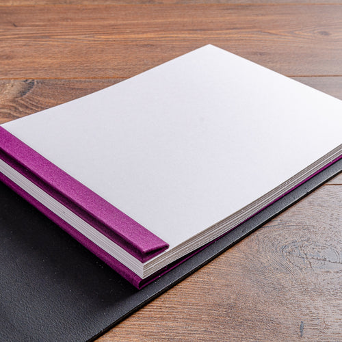 Screw post binding mechanism with white A4 landscape pages in leather guest book