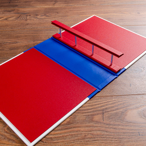 Large screw post binder waiting to be filled with classic car history and documents