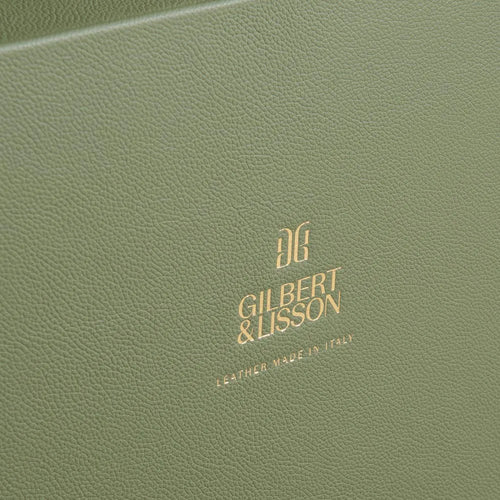 Gold foil embossed logo on leather covered luxury binder