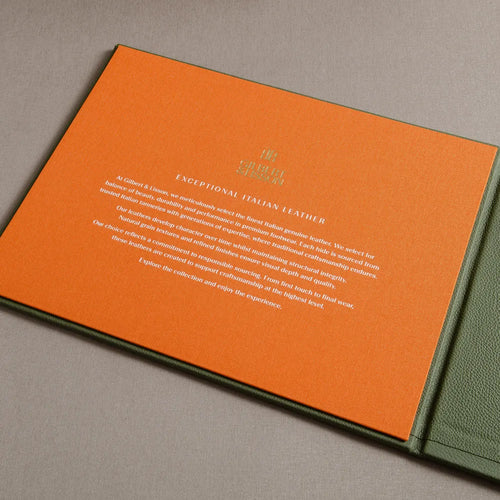 image of white foil embossed inscription on the inner cover of a swatch book