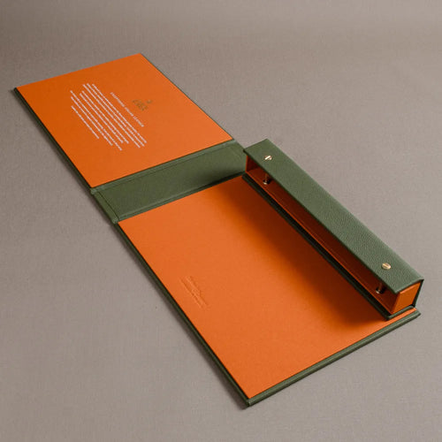 Green and orange leather covered screw post swatch book