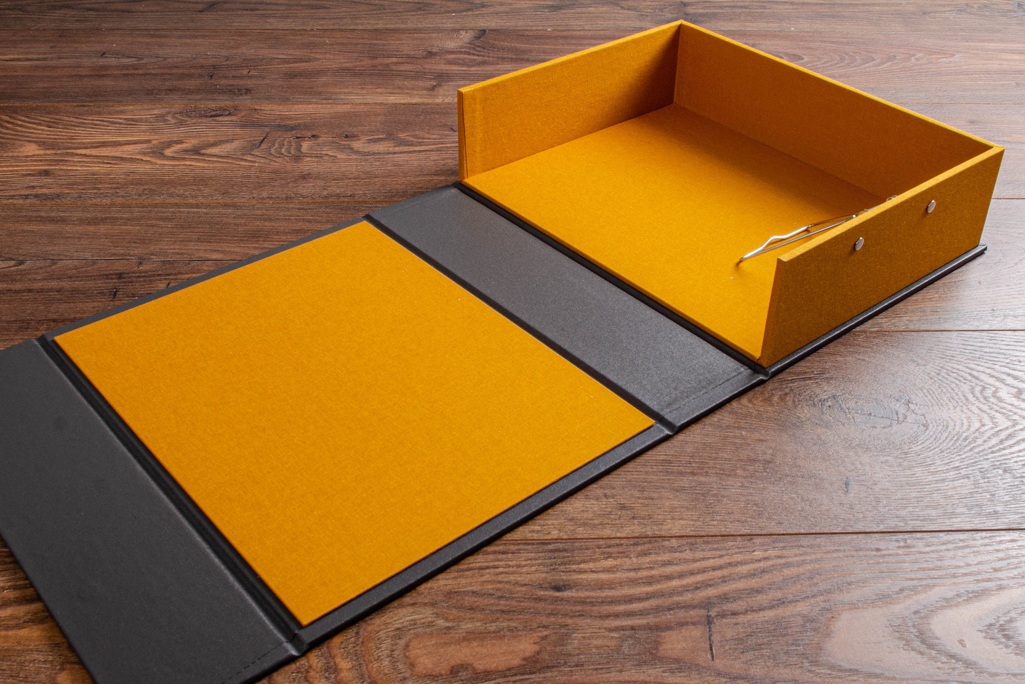 Clamshell vehicle document box with yellow interior 