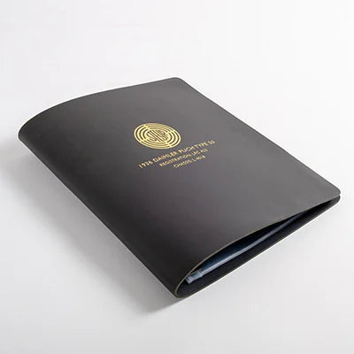 Dark grey leather binder for car documents with text and a logo embossed in gold on the cover - Vehicles, PGB Leather Binders