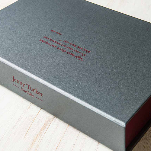silver buckram clamshell box with red foil personalisation
