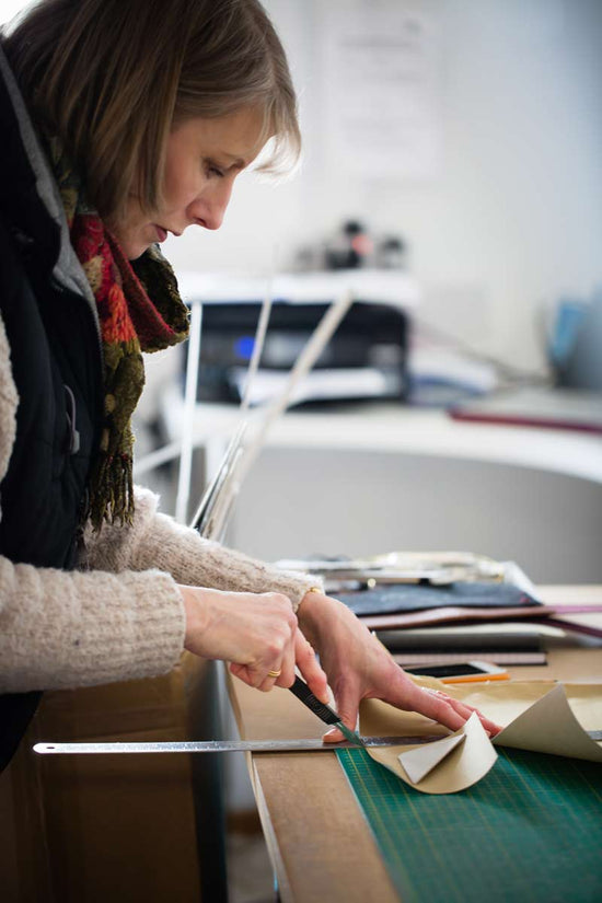 preparing material for custom ring binders