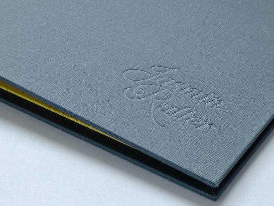 Blind deboss example on the personalised cover of a portfolio book