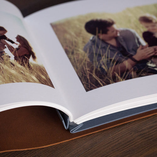 printed photo pages in a leather album