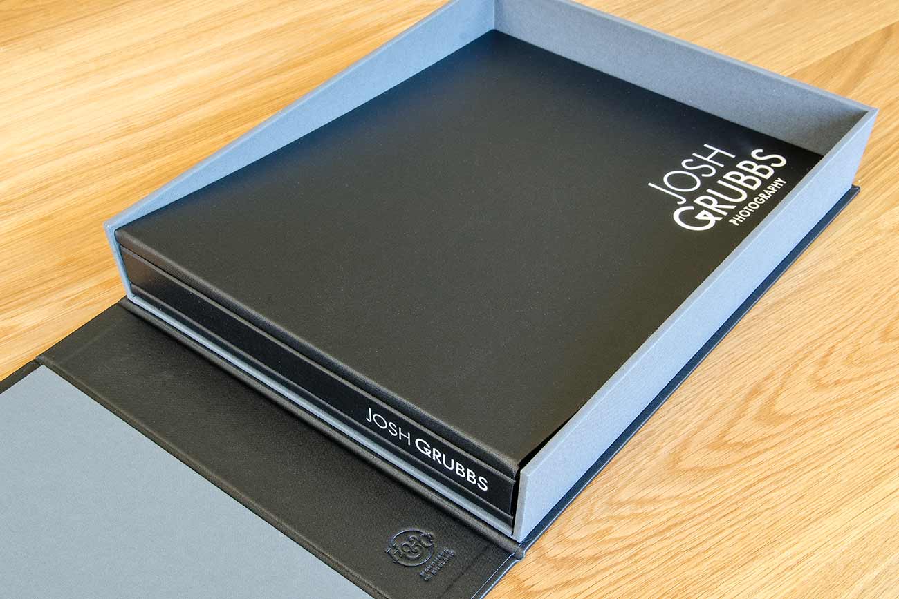 11x17 photographers portfolio book with white foil personalization in a clamshell box.